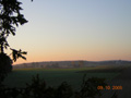 kliknij